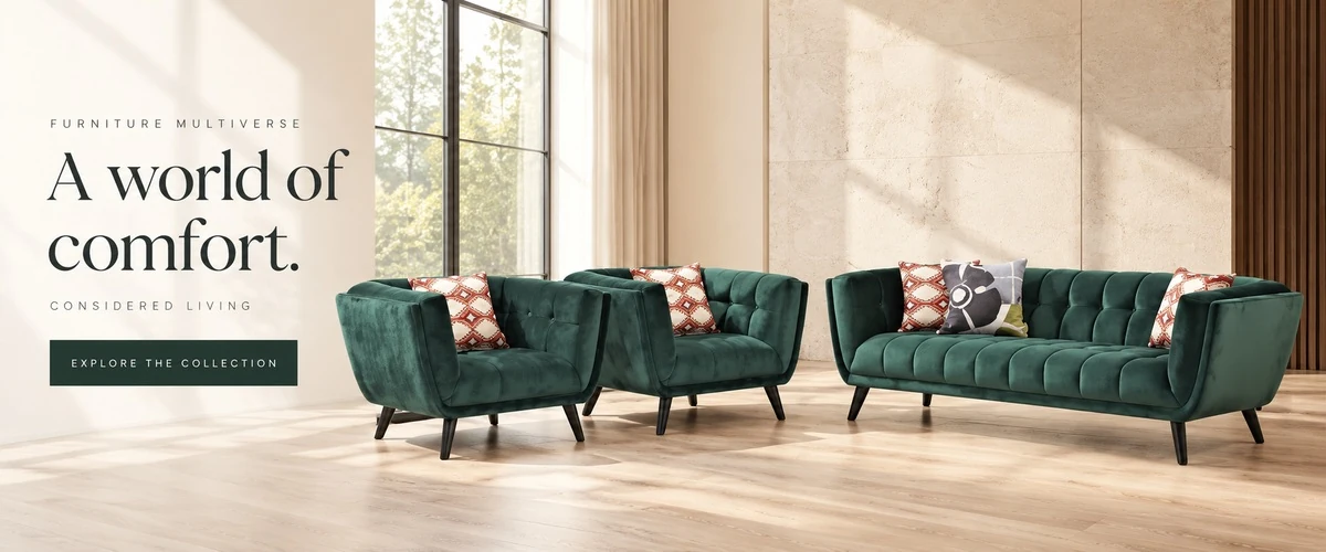 A world of comfort. Green upholstered sofa and two matching chairs in a warm, sunlit room. Explore the collection.